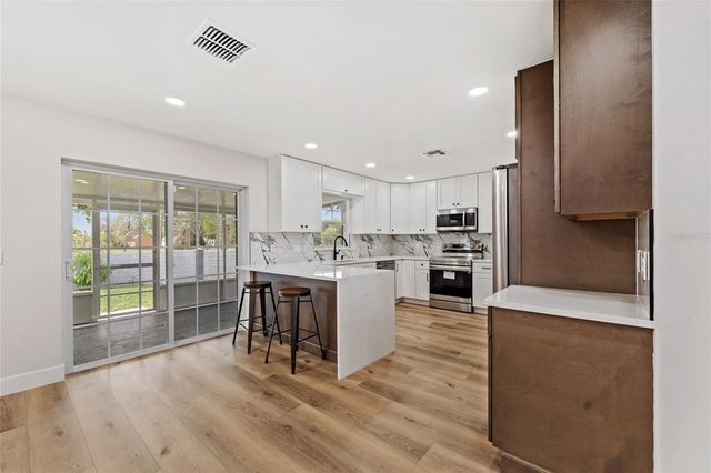 2960 WHITE MAGNOLIA LOOP, Clermont, FL 34711