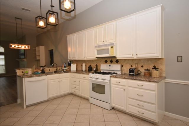 5113 Greenwater Drive, Willis, TX 77318