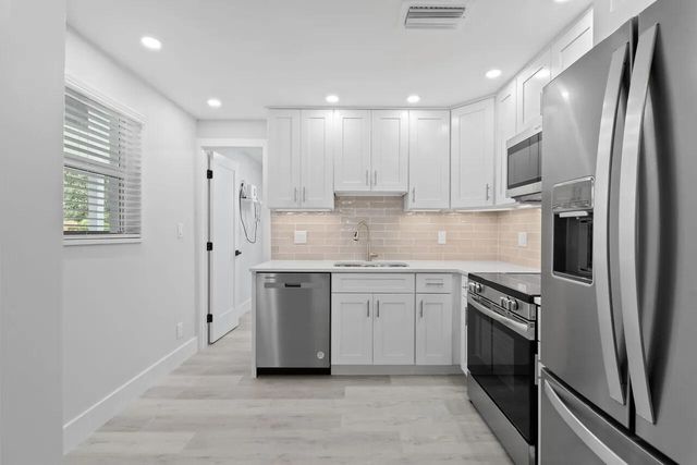 12091 Colony Avenue, Palm Beach Gardens, FL 33410