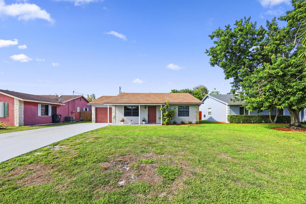 Image 1 of property listing at 3758 Brooklyn Lane, Lake Worth Beach, FL 33461