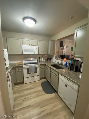 7720 SECRET SHORE Drive 106, Las Vegas, NV 89128