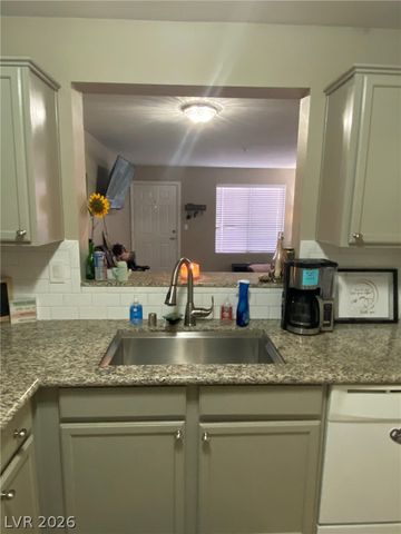 7720 SECRET SHORE Drive 106, Las Vegas, NV 89128