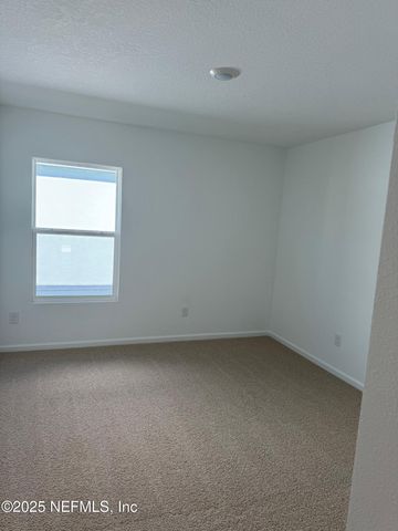 167 GREENWOOD Drive, Palm Coast, FL 32137