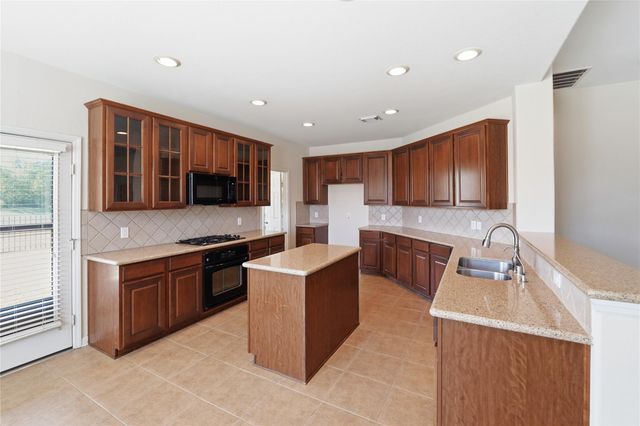 5803 Deleon Trail Drive, Spring, TX 77379