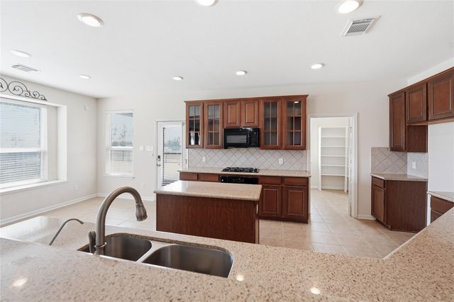 5803 Deleon Trail Drive, Spring, TX 77379