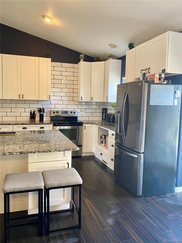 714 School House Drive, Milliken, CO 80543