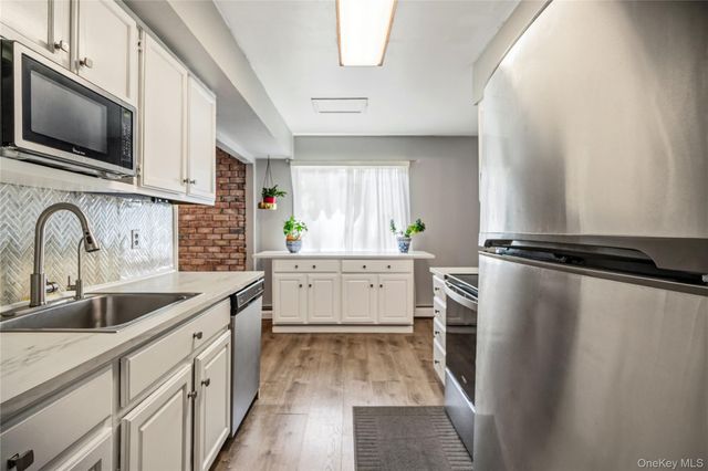 31 Artist Lake Boulevard, Middle Island, NY 11953