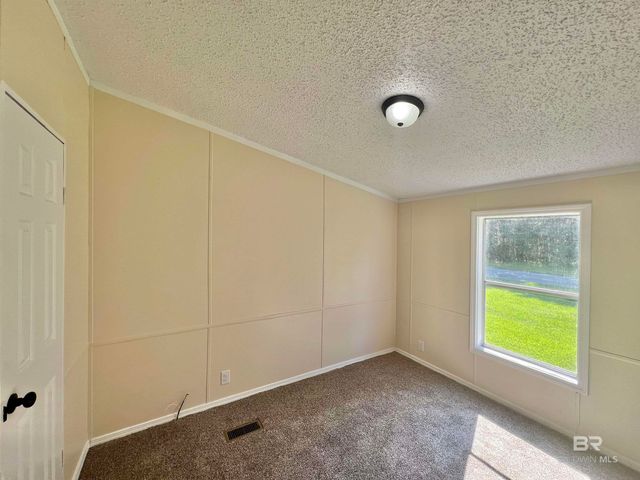 1407 Freemanville Drive, Atmore, AL 36502