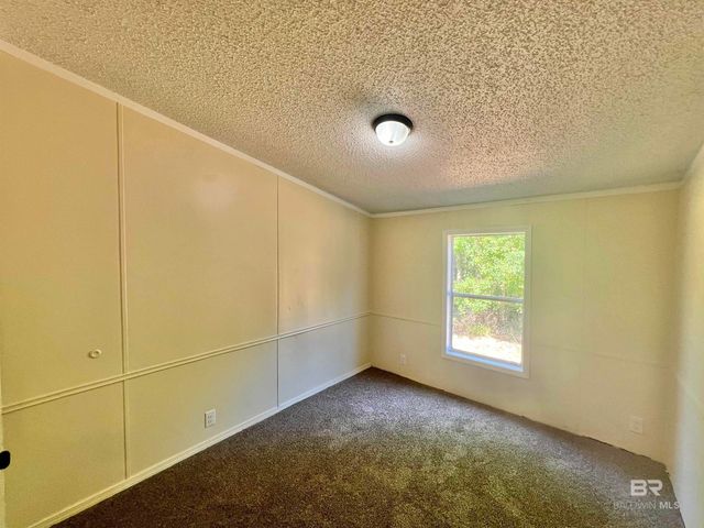 1407 Freemanville Drive, Atmore, AL 36502