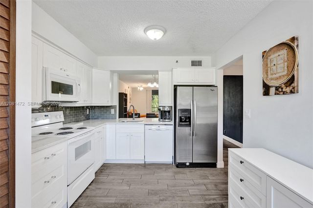 4570 NW 18th Avenue 202, Deerfield Beach, FL 33064