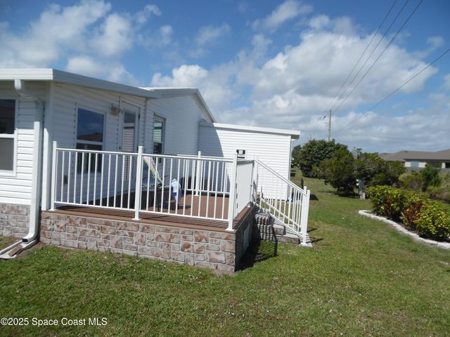 748 Gladiolus Drive, Barefoot Bay, FL 32976