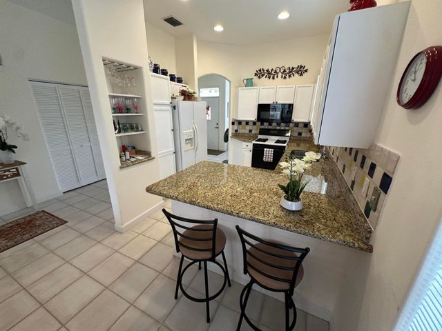 77 Spyglass Way N, Palm Beach Gardens, FL 33418