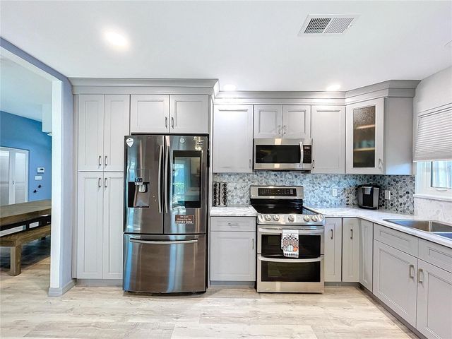 4908 HARBOR WOODS DRIVE, Palm Harbor, FL 34683