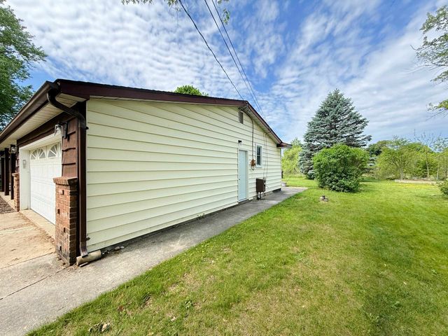 11477 Colonial Woods Drive, Clio, MI 48420