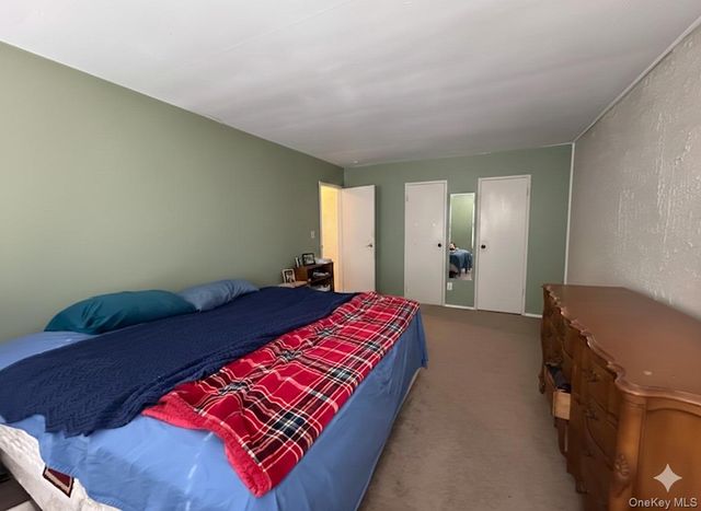 305 Towne House Village, Islandia, NY 11749