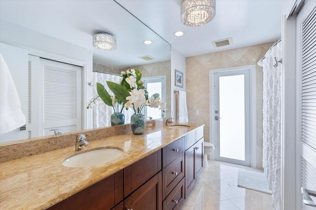 830 NE Boca Bay Colony Drive, Boca Raton, FL 33487