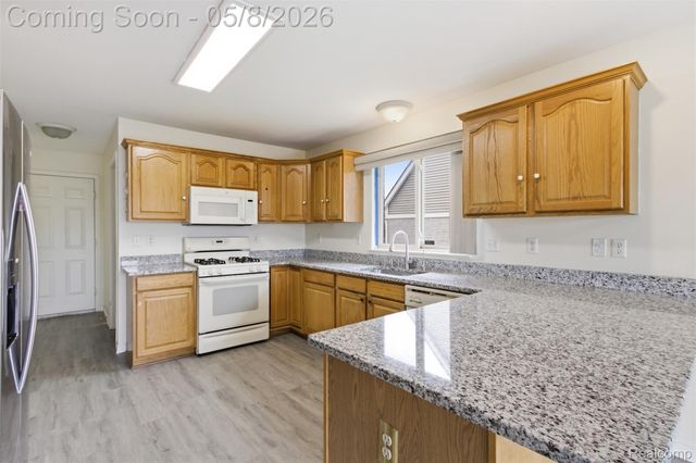 46877 Twin City Trail, Macomb Township, MI 48044