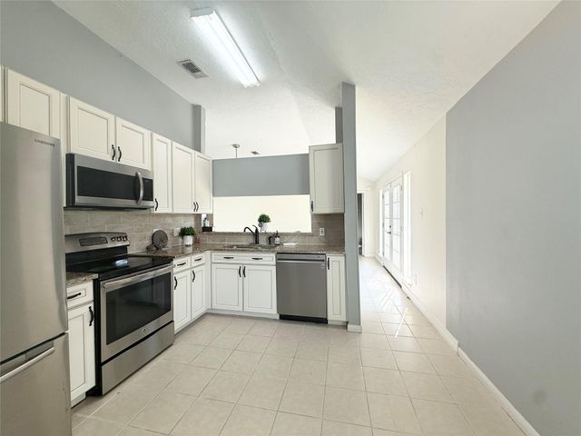 9838 Golden Eagle Street, Conroe, TX 77385