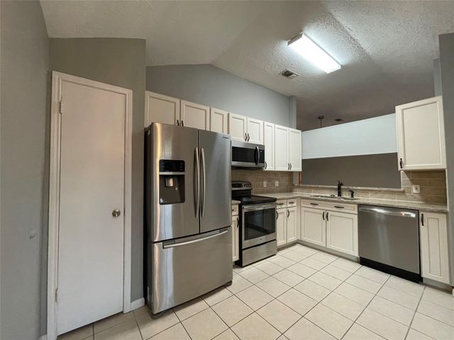 9838 Golden Eagle Street, Conroe, TX 77385