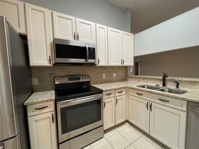 9838 Golden Eagle Street, Conroe, TX 77385