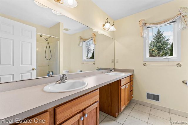 9305 Rotondo Drive, Howell, MI 48855