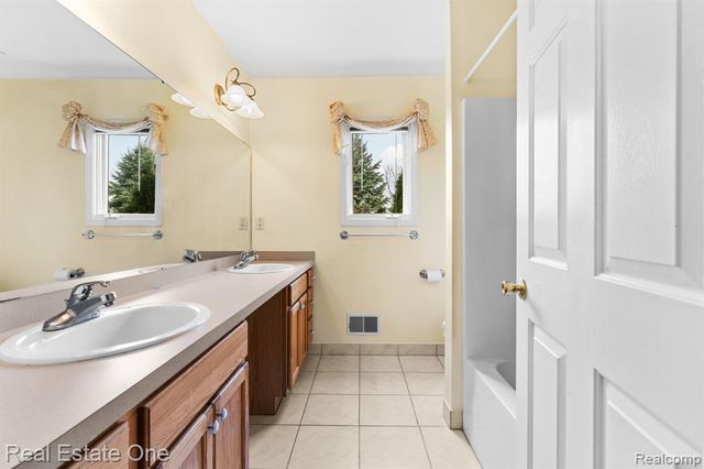 9305 Rotondo Drive, Howell, MI 48855