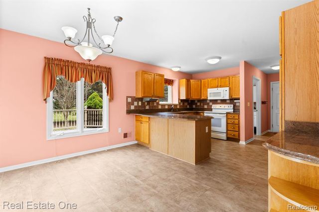 9305 Rotondo Drive, Howell, MI 48855