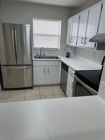 941 CRYSTAL LAKE DR 201, Deerfield Beach, FL 33064