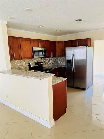 4559 NW 16th Way, Tamarac, FL 33309