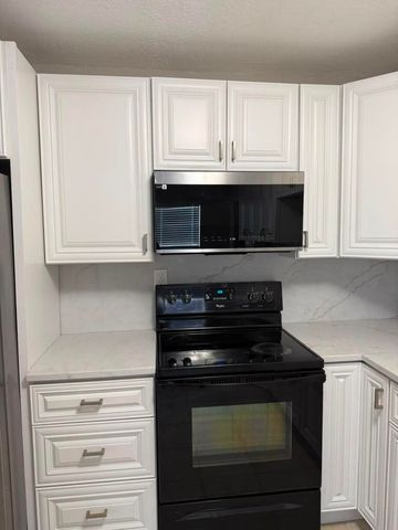 9519 Birmingham Drive, Palm Beach Gardens, FL 33410