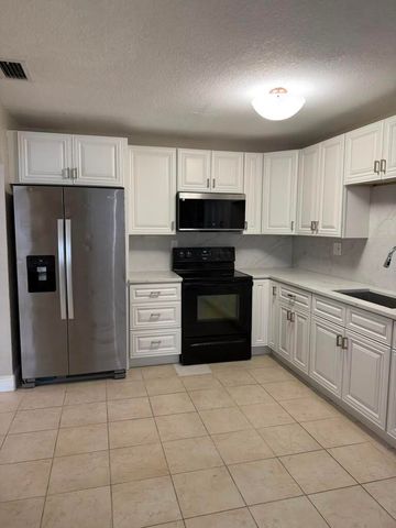 9519 Birmingham Drive, Palm Beach Gardens, FL 33410