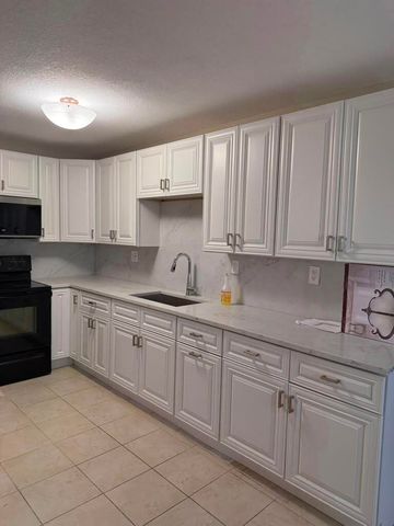 9519 Birmingham Drive, Palm Beach Gardens, FL 33410
