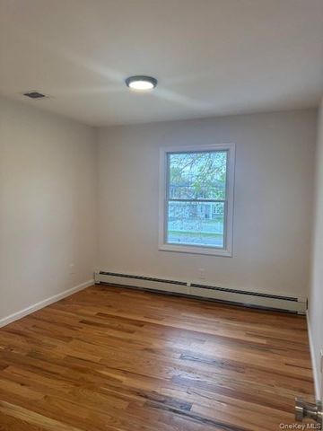 24 Moriches Road, Lake Grove, NY 11755