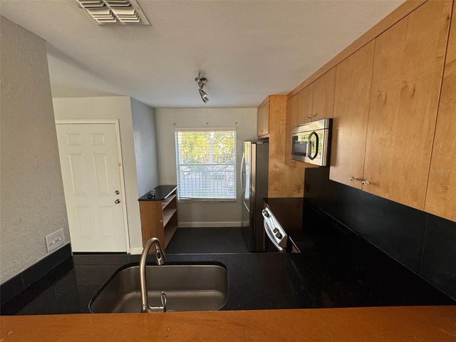 2568 WOODGATE BOULEVARD 205, Orlando, FL 32822