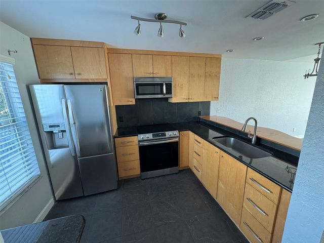 2568 WOODGATE BOULEVARD 205, Orlando, FL 32822