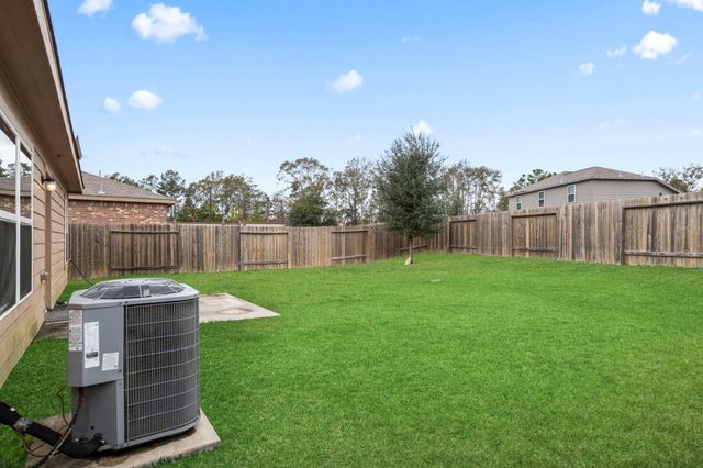 25461 Black Spruce Drive, Cleveland, TX 77328