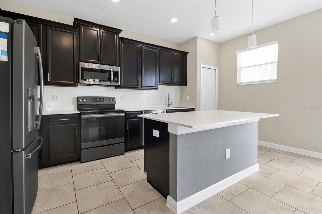 Image 9 of property listing at 4770 TRIBUTE TRAIL, Kissimmee, FL 34746