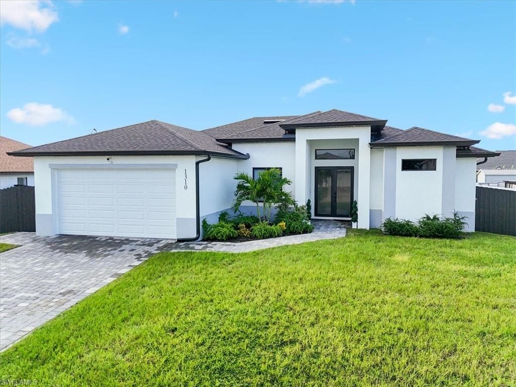 1310 NW 10th TER, CAPE CORAL, FL 33993 — exterior