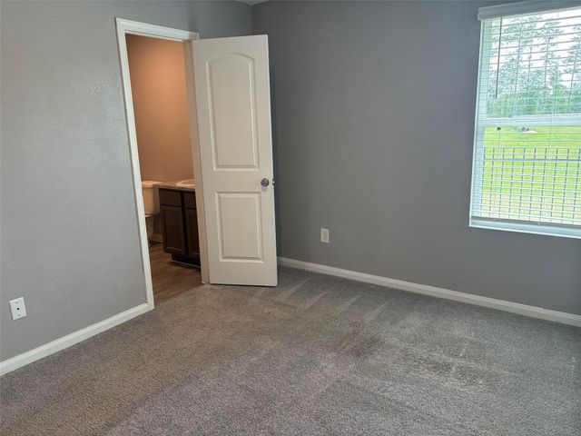 9822 Emerald Stone Way, Conroe, TX 77306