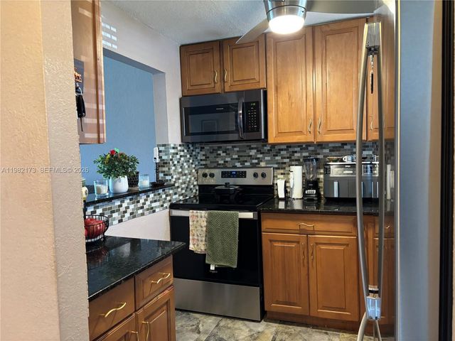 9900 Sunrise Lakes Blvd 107, Sunrise, FL 33322