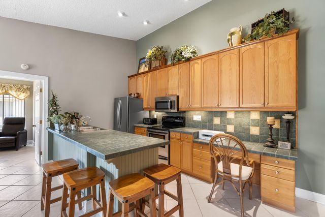 6426 Chasewood Drive E, Jupiter, FL 33458