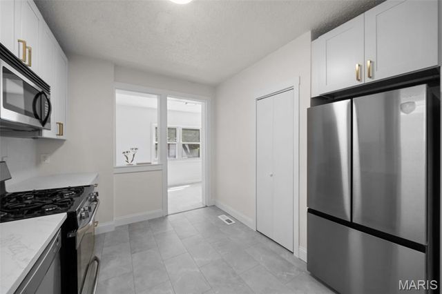 5006 Tholozan Avenue, St Louis, MO 63109