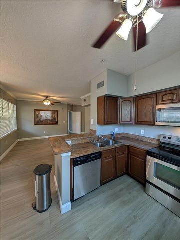 2632 ROBERT TRENT JONES DRIVE 110, Orlando, FL 32835