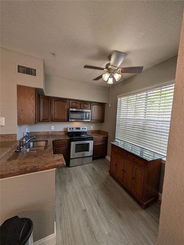 2632 ROBERT TRENT JONES DRIVE 110, Orlando, FL 32835