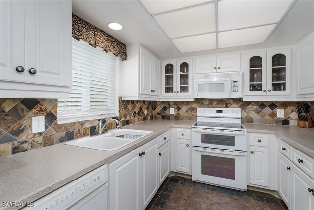 5515 Rattlesnake Hamm RD 205, Naples, FL 34113