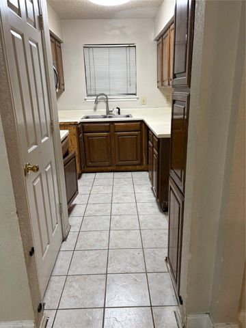 823 W Harwood Road E, Hurst, TX 76054