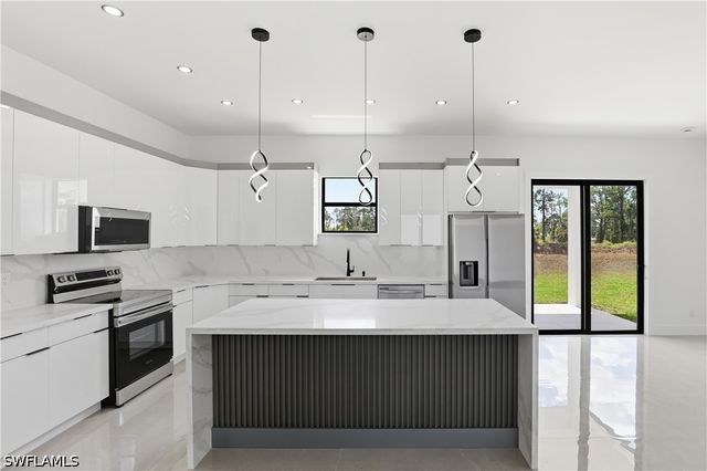 1122 Edelweiss ST E, Lehigh Acres, FL 33974