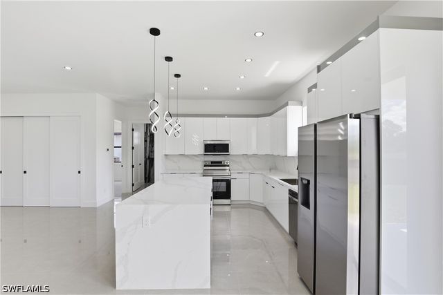 1122 Edelweiss ST E, Lehigh Acres, FL 33974