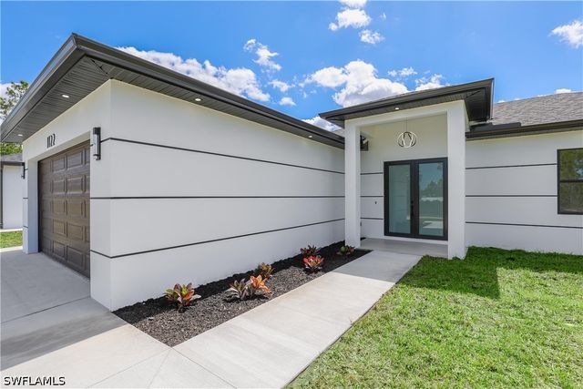 1122 Edelweiss ST E, Lehigh Acres, FL 33974