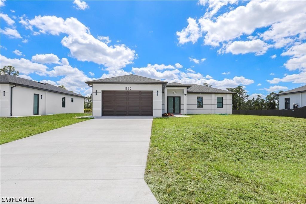 1122 Edelweiss ST E, Lehigh Acres, FL 33974